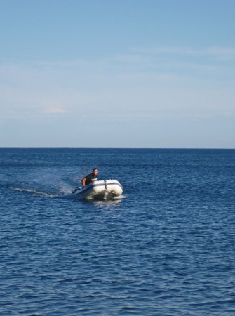 Jon in the dinghy